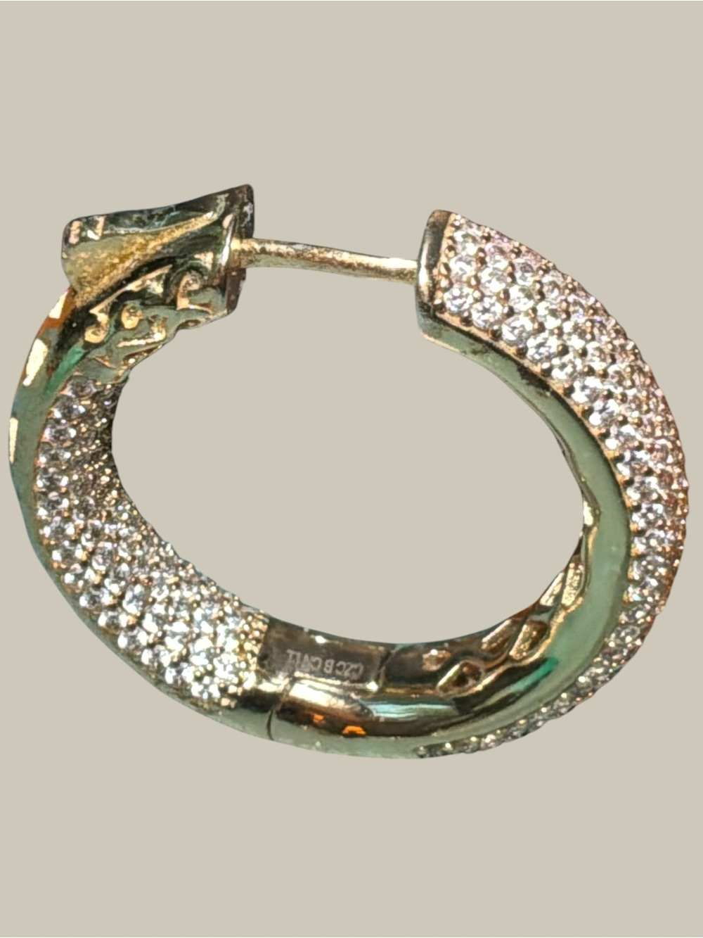 CZ Pave In and Out Hinged Hoop Gold Tone Earrings from Rachel Zoe